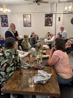 The group attends a dinner after hosting a Machiavelli discussion at the MH Library, July 2026